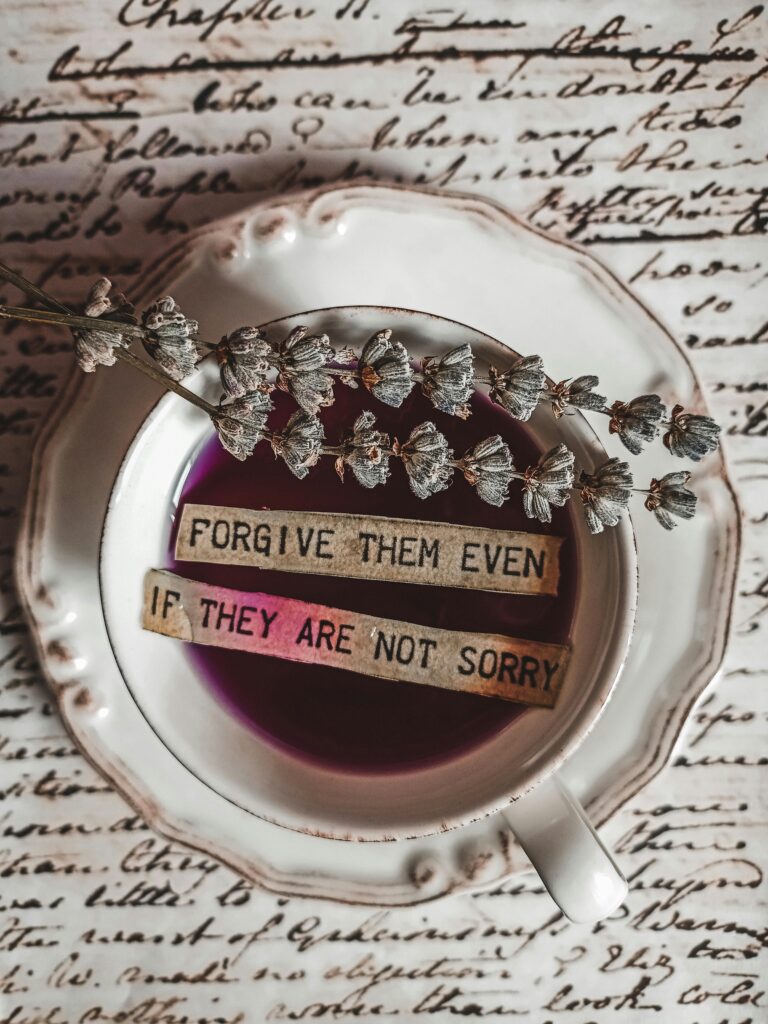 Image of a teacup with tea and a note with lavender.