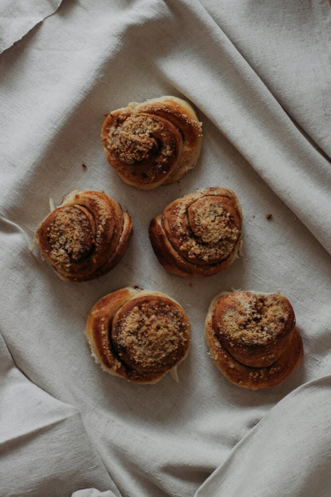 Image of pastries on a white cloth.