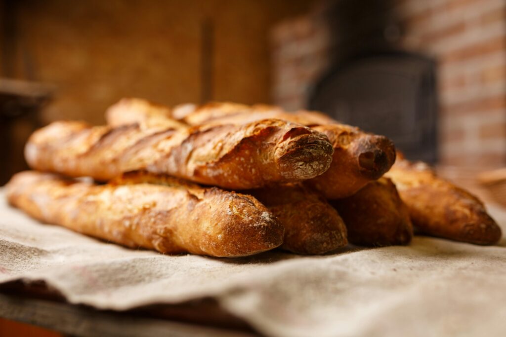 Image of freshly baked bread on a cloth.