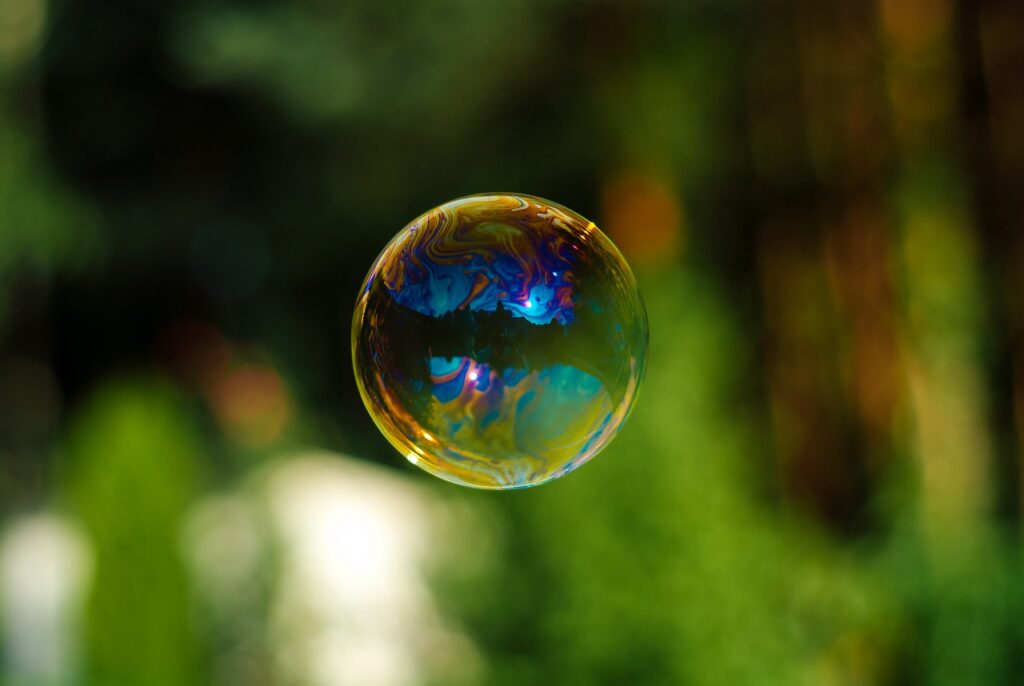 Image of a bubble floating in air.