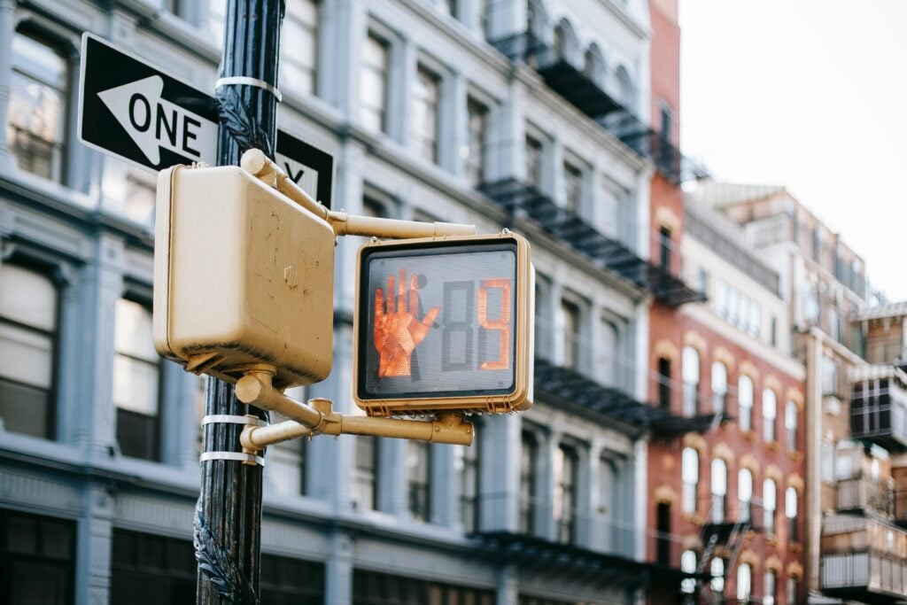 A one way sign on the street.