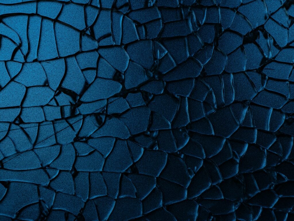 Image of shattered blue glass.