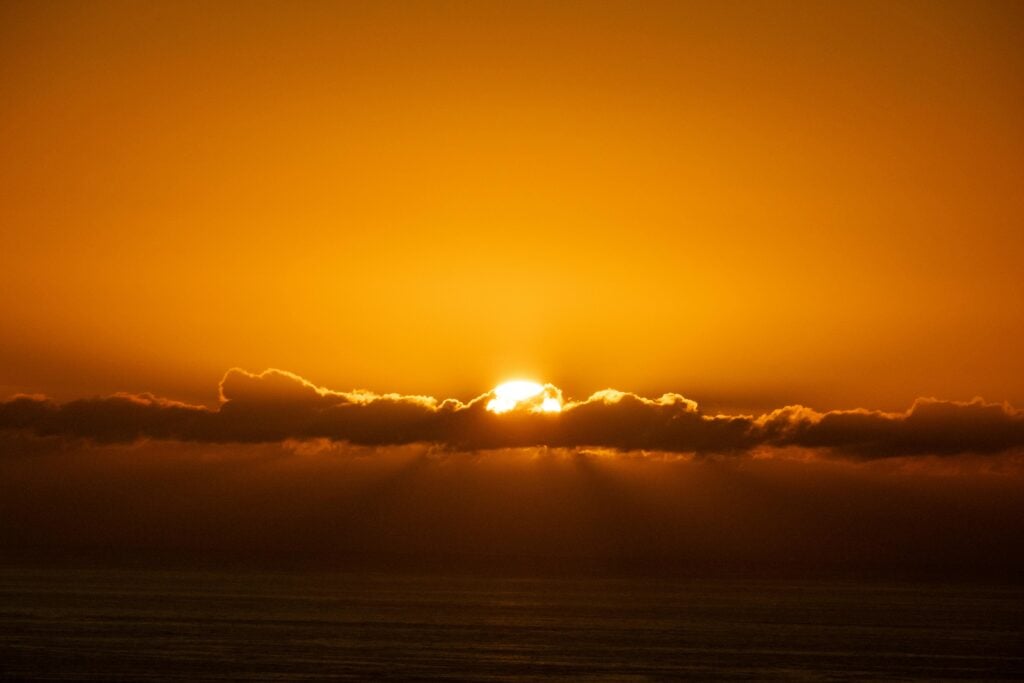 Golden sunset with clouds.