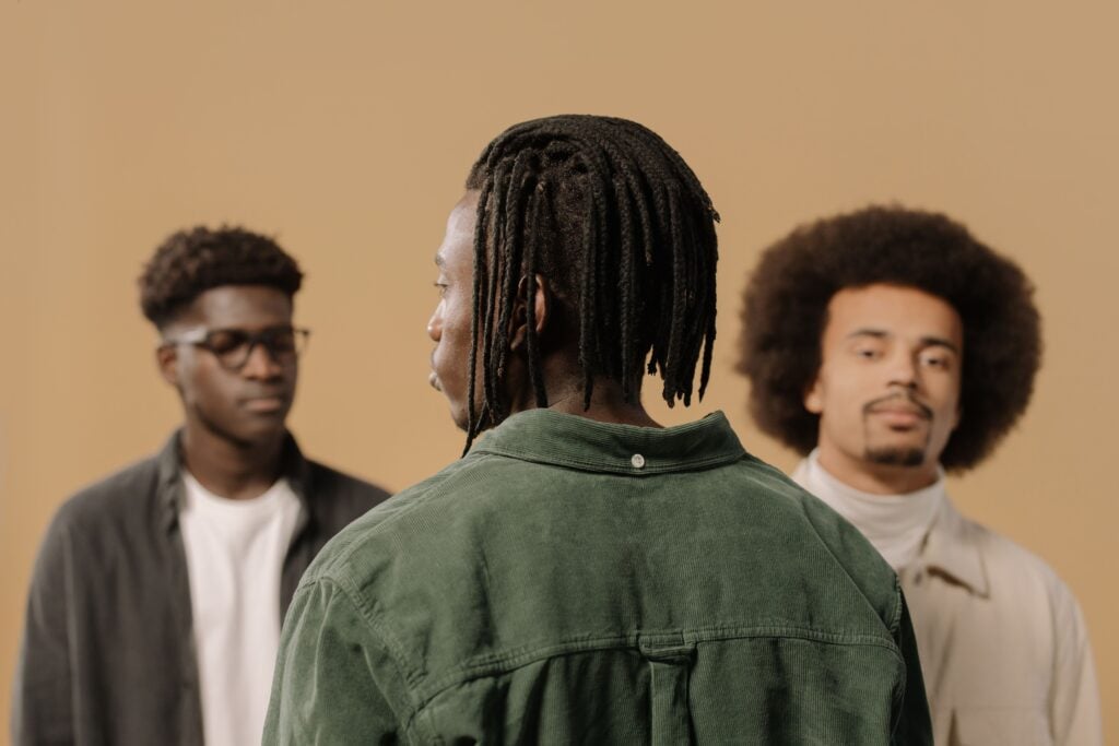 Different shades of black men.