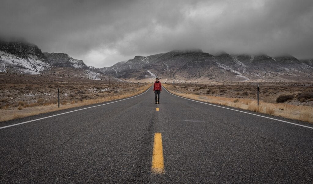 Someone walking on a road path.
